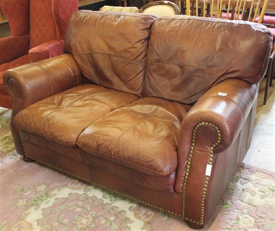 Brown leather sofa(-)